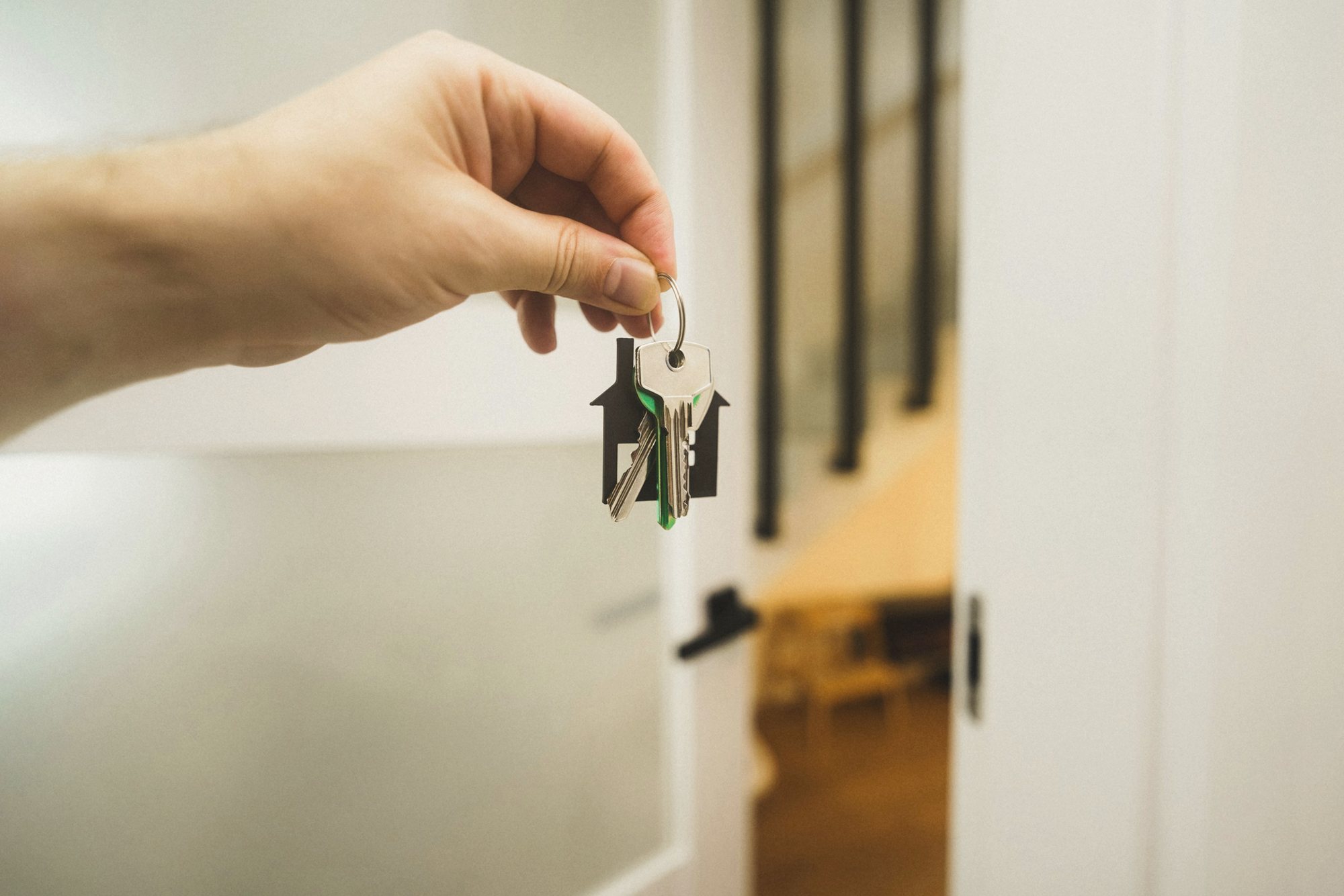 House keys on a table after a property completion